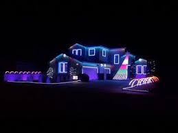 Christmas Lights With Some Unusual Effects Note The Sequenced Flood Lights A Quick Color Effect Withou Flood Lights Outdoor Christmas Lights Christmas Lights