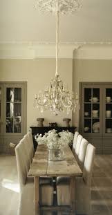 Mixing Plank Table Antique Chandelier Slip Chairs Pared Back Elegance Country Dining Rooms Home Home Decor