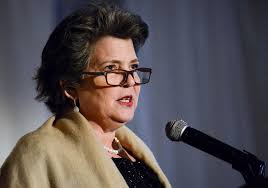 Madonna Badger tells Girl Scouts of the power of love