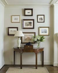 Group framed pictures for dramatic effect. Wall Art Ideas Tips For Hanging Arranging Laurel Home