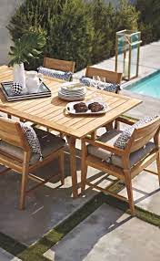 This 5 piece dining set seats 8 people and includes a square table with 4 backless benches. Modern Lines Pair With Classic Teak Construction For Relaxed Yet Sophisti Modern Outdoor Dining Furniture Outdoor Patio Furniture Sets Outdoor Dining Furniture