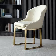 The zero gravity feature provides a minimized spinal stress position by elevating the legs above the heart and positioning the spine on a. Beige Faux Leather Upholstered Dining Chair Gold Frame Set Of 2