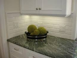 Dark Green Granite With White Cabinets Green Granite Countertops White Beveled Subway Tile Subway Tile Backsplash Kitchen
