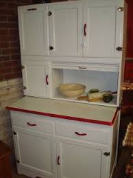 There are 35470 red antique kitchen for sale on etsy, and they cost $29.19 on average. Colonial Square Antique Mall Llc White Hoosier Cabinet Red Trim And Hardware Hoosier Cabinet Vintage Cabinets Red Kitchen Decor