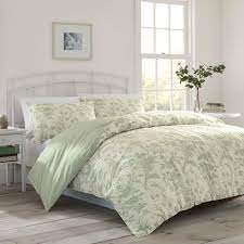 A bedspread drapes all the way to the floor for total coverage that fully encompasses a bed, giving it a formal look. Laura Ashley Natalie Sage Green Cream Standard Cotton 150 Tc Reversible Farmhouse Country Comforter Set Reviews Wayfair