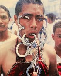 Here is a photo I took in Trang, Thailand in 2002 at the Vegetarian  festival.. I barley ever post