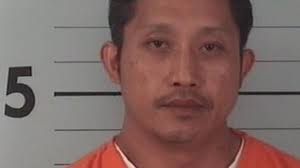 Man gets weapon, drug charges at Walmart