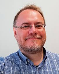 Risks and Benefits of Large Language Models for the Environment