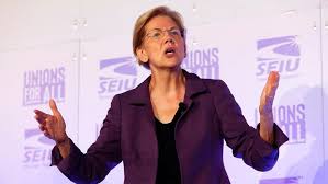 Warren dismisses top staffer for inappropriate behavior