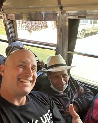 Irvines, carrying live chickens