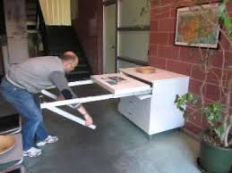 Minimalist modern dining table with solid beechwood legs. Folding Away A Pull Out Kitchen Table Frame Youtube