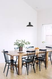 We Really Like The Wooden Table With The Contrasting Black Chairs The Look Has Im White Wood Dining Chairs Farmhouse Dining Room Table Wood Dining Room Chairs
