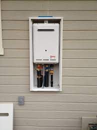 Tankless hot water heater outside. Tankless Water Heater Cabinet