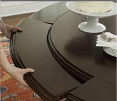 The table is 60 round with 12 leaves on both side. Deluxe Expandable Dining Tables Make Room For More