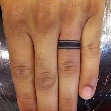 40 Awesome Finger Ring Tattoos For Men And Women Ringtattoo Weddingringtattoo Weddingtattoo T Ring Tattoo Designs Ring Finger Tattoos Tattoo Wedding Rings