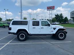 Specialized in building the finest custom lifted jeep gladiator trucks with the best brands & high quality parts. Jeep Gladiator With Are Topper Jeep Gladiator Jeep Life Jeep