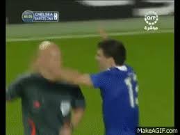 The ball was headed up in the center and dropped to an unmarked michael ballack on the. Michael Ballack Vs Referee Tom Henning Ovrebo Causa Polemica On Make A Gif