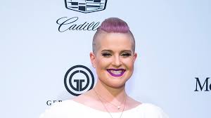 Kelly osbourne looks ready for spring as she rocks purple hair and floral patterned skirt on extra. Kelly Osbourne Just Dyed Her Hair Orange And Looks Like A Totally Different Person Allure