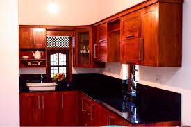 The two cabinet doors open. Wooden Pantry Cupboard See Win Homes