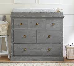 Set dressers arrange objects on a film set before rolling the camera. Charlie Changing Table Dresser Topper Pottery Barn Kids