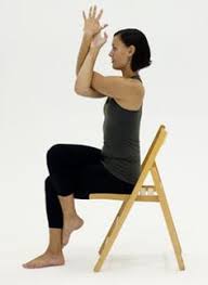 10 Yoga Poses You Can Do In A Chair Chair Pose Yoga Chair Yoga Yoga Poses