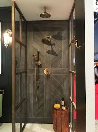 This neutral bathroom matched the beige paint to the floor's marble tile, then added subtle silver accents for a little bit of glam. 25 Wood Tile Showers For Your Bathroom