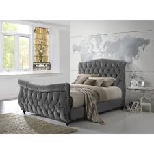 This dreamy bed features a sleigh silhouette with rolled edges and full upholstery for a cozy finish. Super King Size Sleigh Bed In Brown Or Grey Velvet