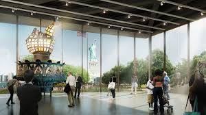 View of the statue of liberty from the site of the explosion: The Statue Of Liberty Museum Holds Original Torch Soaring Theater Space Amnewyork