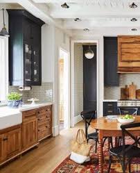 Transitional kitchen with black cabinets & copper vent hood. 27 Black Wood Ideas Kitchen Design Kitchen Inspirations Modern Kitchen