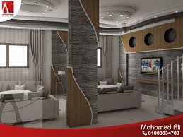 منطقة الليفينج بالاعمدة تم تجليدها بحجر وخشب مكسى بالقشرة column design design home decor