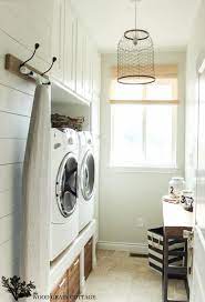 This light and airy laundry room/mudroom beckons you with two beautiful white capiz seashell pendant lights, custom floor to ceiling cabinetry with crown molding, raised washer and dryer with storage underneath, wooden. 60 Best Farmhouse Laundry Room Decor Ideas And Designs For 2021