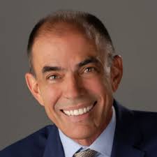 I like this picture for three reasons 1. it shows Blackrock's top two sales  leaders of the year 2. They are both University of Dayton finance graduates  who interned together at Blackrock.