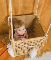 Baby Boy Sitting In The Basket Of A Hot Air Balloon Close Up Stock Photo Picture And Royalty Free Image Image 73263926