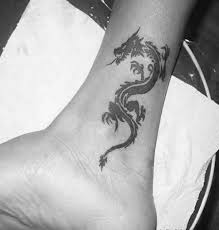 Similarly, dragon tattoos for men inked in pure black or grey ink look cool and stunning. Enchanting Easy Small Dragon Tattoo Small Dragon Tattoos Small Tattoos Momcanvas