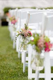 Here we share some ideas that we have easy, just install some beautiful wedding ceremony flowers! Gorgeous Fall Wedding At Trapp Family Lodge Vermont Wedding Ceremony Chairs Wedding Chair Decorations Ceremony Decorations Outdoor