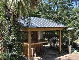 Photo about a detail of the palm thatch roof of a beach side tiki hut. Tiki Hut Houzz