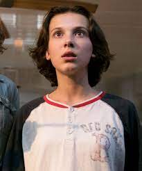 She rose to prominence for her role as eleven in the netflix science fiction drama series stranger things (2016), for which she earned a primetime emmy award nomination for outstanding supporting actress in a drama series at age 13. Millie Bobby Brown Wants To Do A Rom Com Are You Hearing This Netflix Bobby Brown Millie Bobby Brown Short Hair Styles