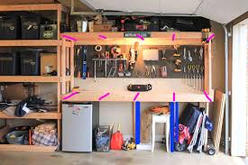 Most of the time a workbench in the garage is used to store tools. Garage Shelving With Workbench Photo Isaac Cuenca Auto
