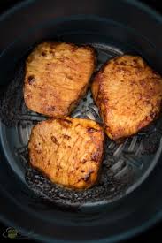 Air fry for 4 minutes, turn them over, spray the top with more cooking spray and air fry an additional 4 minutes or until an internal temperature reaches 145°f. Best Air Fryer Boneless Pork Chops Enjoy Clean Eating