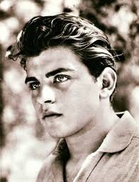 Earthling Art by Gilbert Monsanto Created by David Brinks Real name: Fabian  Rheinhardt Place of birth: Franciscushaven, The Netherlands Eyes: yellow  Hair: orange Skin: deep red Physical characteristic: the number 269 burnt