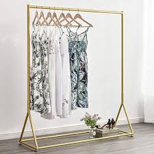 Maybe you would like to learn more about one of these? Metal Garment Rack With 2 Wood Shelves Gold Clothing Rack Heavy Duty Free Standing Retail Display Clothes Racks For Hanging Clothes Boutique Store 47 Home Kitchen Clothing Closet Storage Botani Com Au