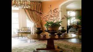 With tabletop decor of a glass vase of flowers, books and a small china bird, your round entryway table display is complete. Round Entrance Hall Table Decor Ideas Youtube