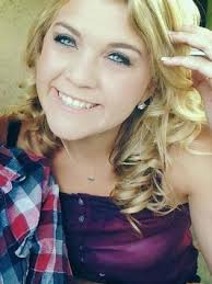 Cheerleader charged in homeless man's murder