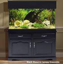 Crafted from wood veneer laminated particleboard and metal hardware accents. 14 Fish Tank Cabinet Ideas Fish Tank Fish Tank Cabinets Tank Stand