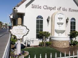 Memorial chapel seats up to 130 people in traditional pews with padded kneelers. Chapel Of The Flowers Las Vegas
