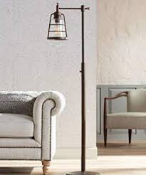 100 Farmhouse Lamps Discover The Top Rated Farmhouse Style Lamps For Your Rustic Home We Love Rust Bronze Floor Lamp Farmhouse Floor Lamps Lamps Living Room