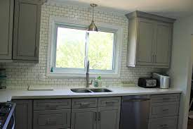 .kitchen cabinet solutions located in byersville peterborough is an excellent choice if you are looking for kitchen cabinets or kitchen and cabinets. Peterborough Family And Their Painted Grey Kitchen Cabinets With Cool White Quartz Countertop Kitchen Cabinets And Granite Countertops I Rockwood Kitchens