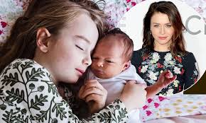 Caterina Scorsone welcomes her third daughter with husband Rob Giles ahead  of the new year