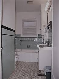 The bold use of tilework in these two bathrooms may look original to the 1930s, but every square foot is all new. 1930 S Classic Bathroom Powell Construction