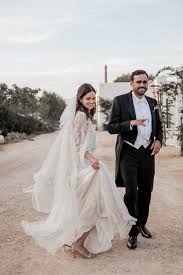 Inside liberty warehouse, the aisle was flanked by tall cacti in terra cotta pots. This Masseria Potenti Wedding In Puglia Nails Rustic Italian Effortlessness Junebug Weddings